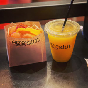 eggslut sandwich and orange juice